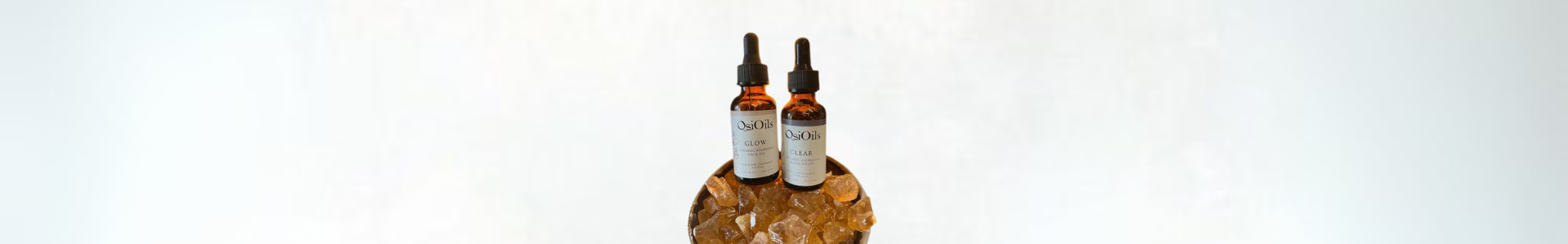 Osi Oils Glow Face Oil and Clear Nasal Drops used in daily Ayurvedic rituals to support Ojas, vitality, and emotional well-being