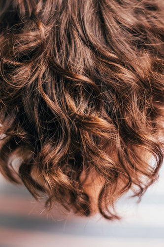 Image of healthy hair, representing the importance of Ayurvedic care in managing hair loss.