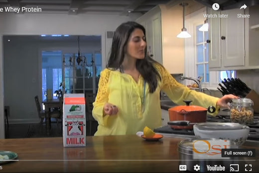 Woman cooking kitchari in the kitchen for a detox meal